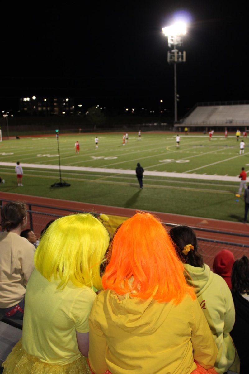 Elizabeth Crisostomo Krasowska and Yuliia Kuravska dressed up in full yellow for support of childhood cancer awareness at the Sept. 16 boys' soccer game. Photo by Bella Howard
