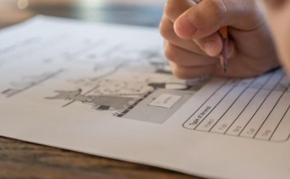 Student completing homework assignment. Photo from Unsplashed.com.