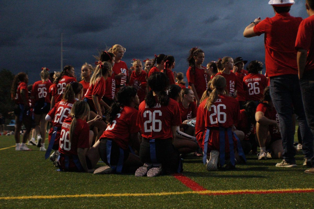 A look at the Senior Powderpuff team’s halftime huddle, Sept. 22. Photo by Harper Downey.