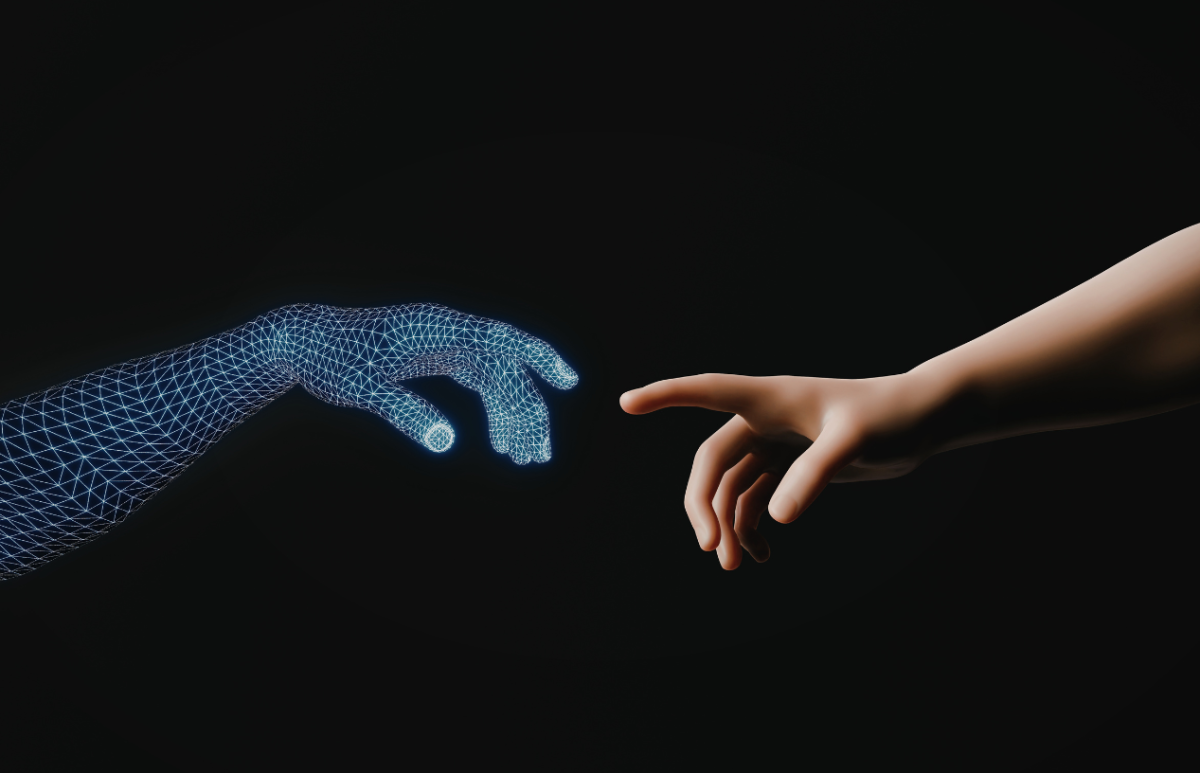 An AI and a human arm reaching out. Photo from Canva.com. 