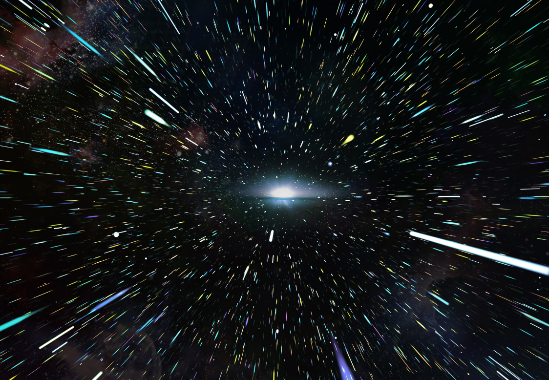 Photo of space along with stars passing by. Photo from Canva.com.