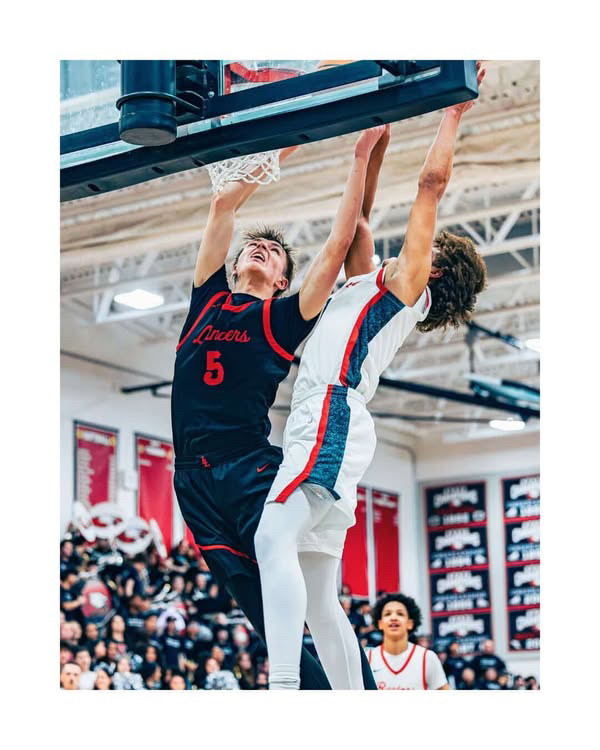 Junior Zach Hoskins dunking the ball. Photo courtesy of Peyton Winsor.