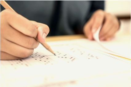 Student taking a test. Photo courtesy of Canva.com.