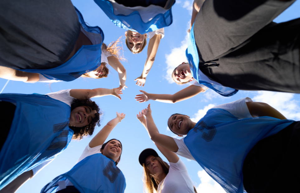 A sports team huddle. Photo from Canva.com. 
