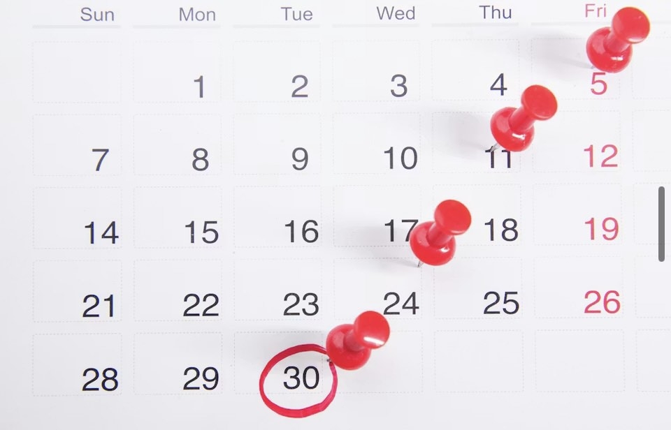 Calendar with pins specifying specific days. Photo from Unsplashed.com. 
